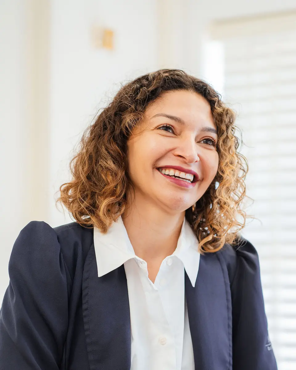 Aline Brito, founder of Aline Brito Beauty Clinic, smiling in her clinic in Clane